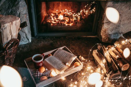 Warm,Cozy,Fireplace,With,Real,Wood,Burning,In,It.,Magical