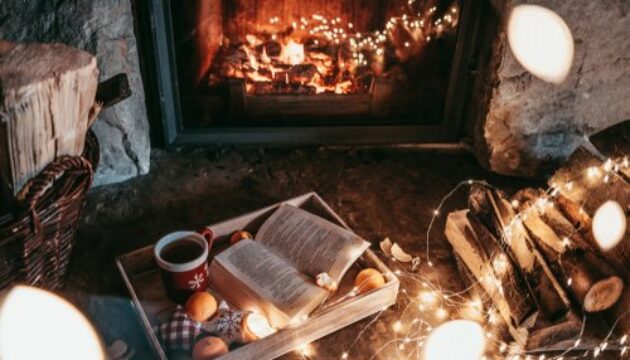 Warm,Cozy,Fireplace,With,Real,Wood,Burning,In,It.,Magical